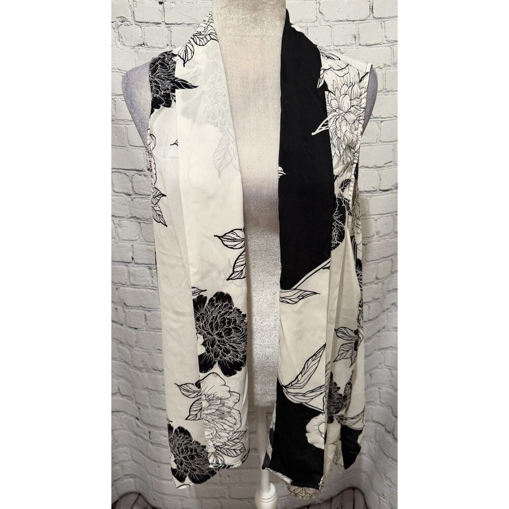 Iman floral semi-sheer vest features a distinct black and white peony print XL